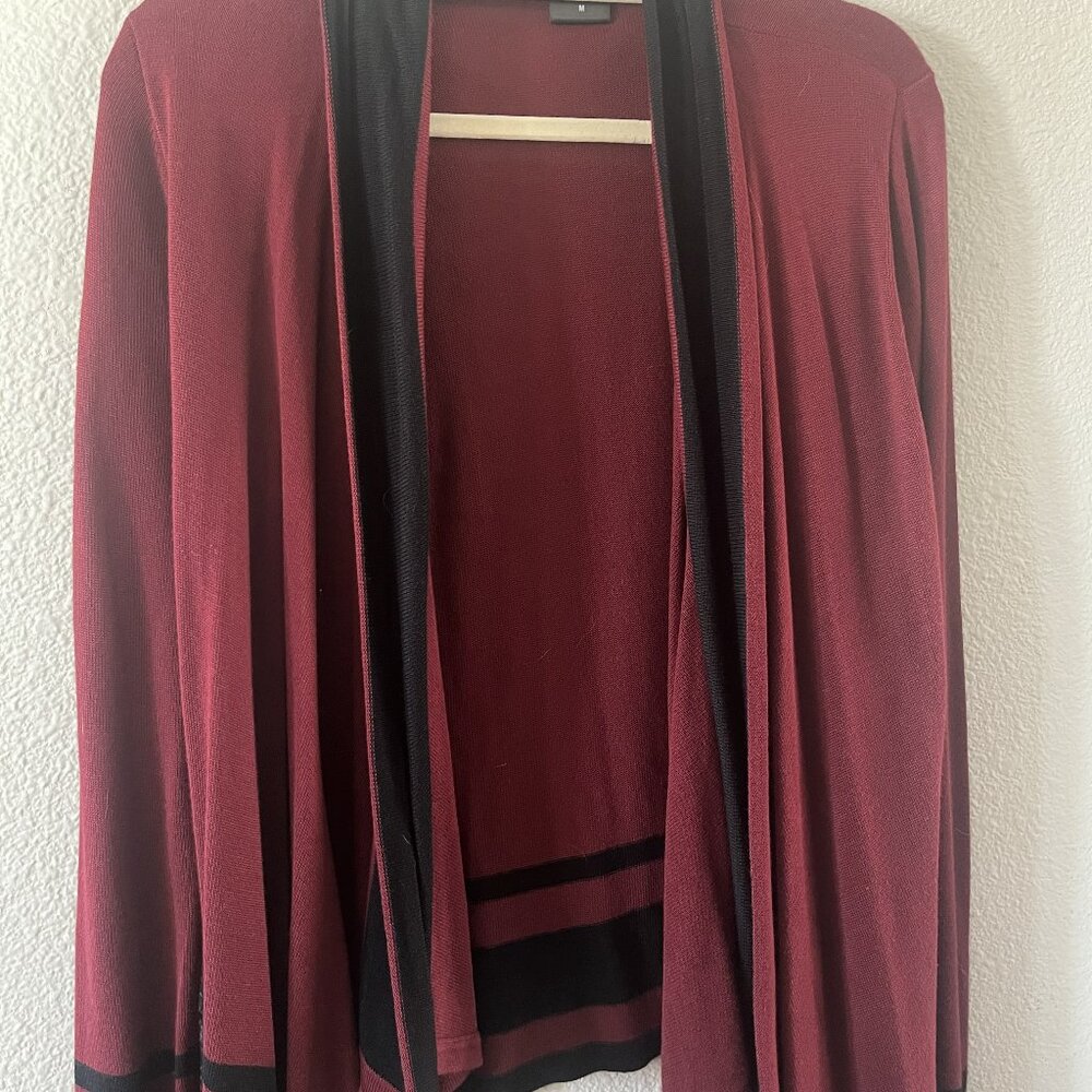 Red wine-colored duster sweater with Black accent lines